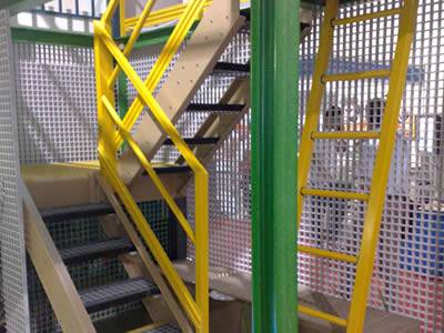 The FRP stair treads are installed with the wood structure, which forms the whole stair system.