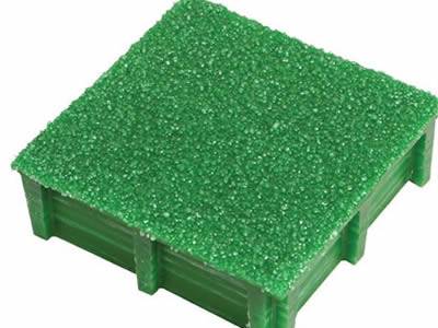 It is one piece of covered fiberglass grating with gritted surface.