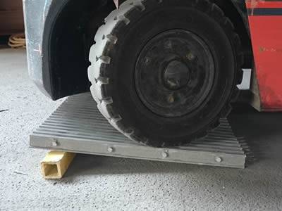 It shows one truck wheel is pressing on the pultruded heavy duty fiberglass grating.